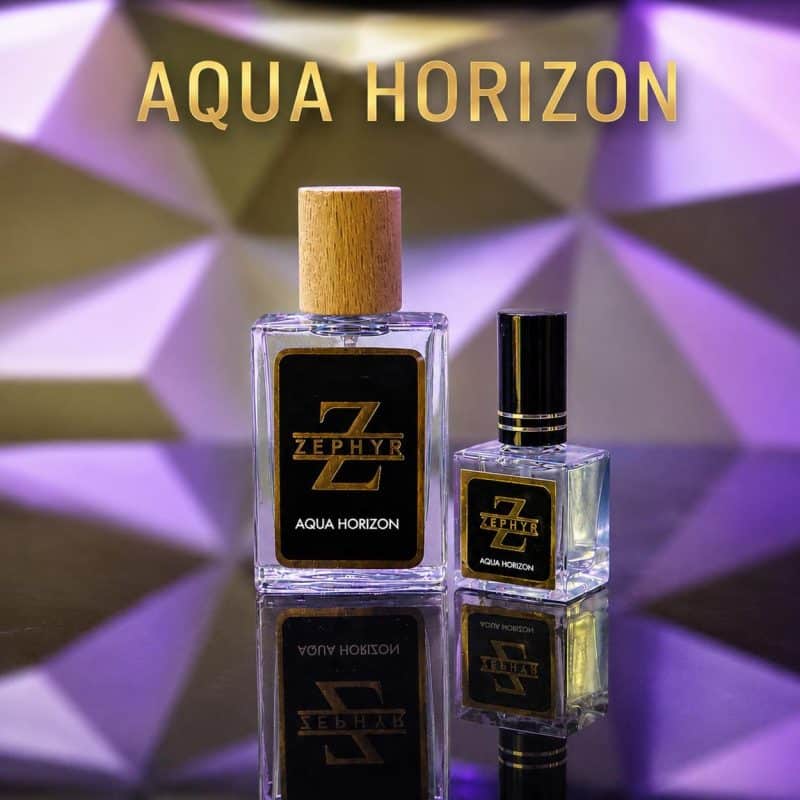 Zephyr Aqua Horizon Eau de Parfum premium clear glass bottle with a dense matte black cap on a glossy reflective studio surface with purple lighting.